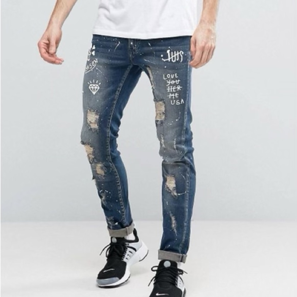 Reason Extreme Distressed Slim Jeans With Paint Splat‎ And Skull Stencil